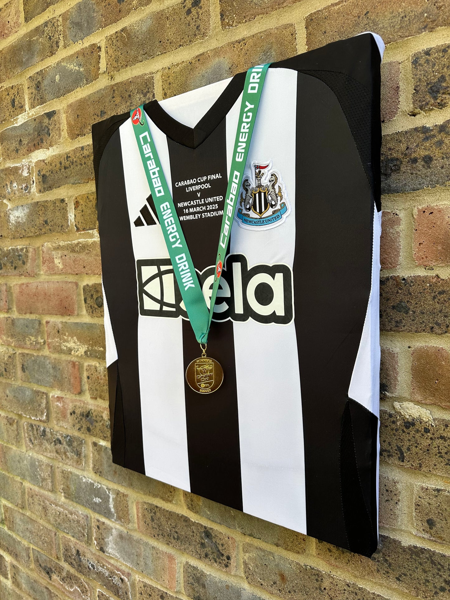 Newcastle United carabao cup final shirt and winners medal 2025 memorabilia canvas