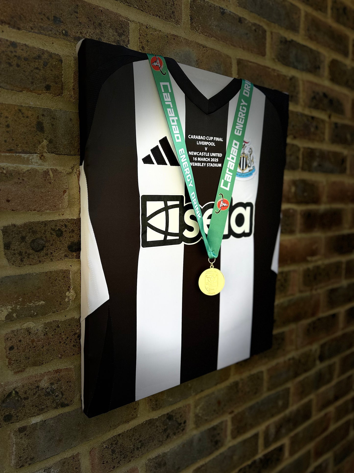 Newcastle United carabao cup final shirt and winners medal 2025 memorabilia canvas